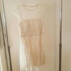 cap sleeve ivory lace dress with nude underlay